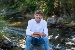Littleton family and high school senior photographer Colorado Morrison park Class of 2025 siblings river photography teenager boy basketball player