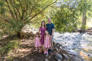 Littleton family photographer Morrison park Colorado sisters mother father daughter river water bridge photography