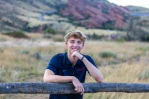 Littleton high school senior photographer Mt. Falcon east trailhead Morrison Colorado red rocks teenager boy basketball college bound Heritage photography class of 2025