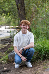 Littleton high school senior and family photographer Colorado Highlands Ranch Thunder Ridge photography Morrison Park South Valley red rocks sunset twin boys brothers twins class of 2025 river