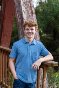 Littleton high school senior and family photographer Colorado Highlands Ranch Thunder Ridge photography Morrison Park South Valley red rocks sunset twin boys brothers twins class of 2025 bridge