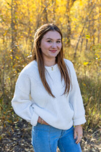 Littleton family photographer Lair O' the Bear park in Morrison Colorado yellow fall leaves trees mother father son daughter brother sister photography river bridge