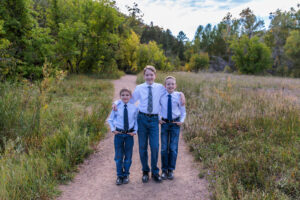 Littleton family photographer Lair O' the Bear park Morrison Colorado boys brothers river water fall leaves photography sunset