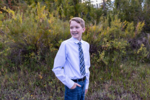 Littleton family photographer Lair O' the Bear park Morrison Colorado boys brothers river water fall leaves photography sunset