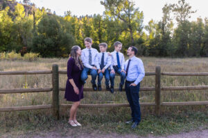 Littleton family photographer Lair O' the Bear park Morrison Colorado boys brothers river water fall leaves photography sunset