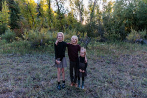 Littleton family photographer Lair O' the Bear fall leaves Colorado sunset photography kids siblings brother sisters mother father son daughters
