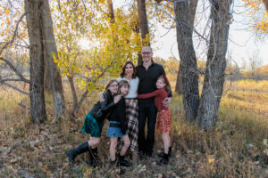 Littleton family photographer 17 Mile House Colorado girls twins sisters siblings mother father daughters fall photography sunset old house