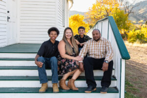 Littleton family photographer Clear Creek Golden Colorado fall leaves boys brothers mother father sons foothills photography river
