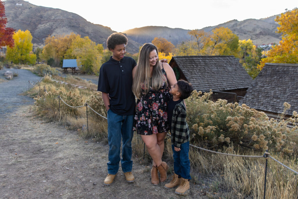 Littleton family photographer Clear Creek Golden Colorado fall leaves boys brothers mother father sons foothills photography river