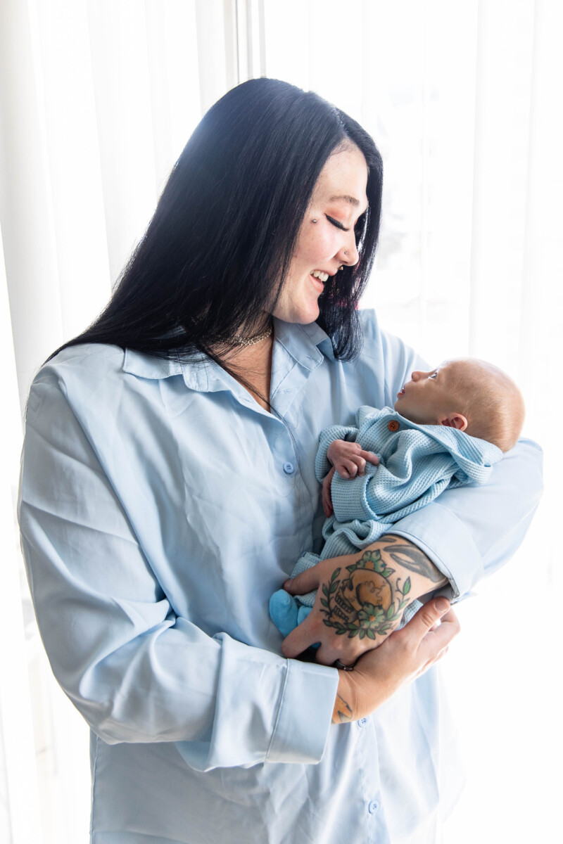 Littleton family photographer Littleton family photographer newborn baby in home lifestyle photography dog big brother little son mother father kids