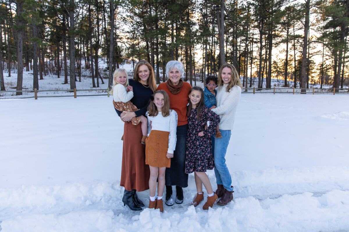 Littleton family photographer extended cousins grandparents siblings snow Dawson Butte trail Castle Rock Colorado photography evergreen trees