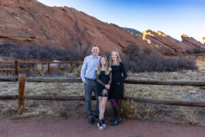 Littleton family photographer Red Rocks Amphitheatre Morrison Colorado photography fall winter mother father daughter