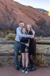 Littleton family photographer Red Rocks Amphitheatre Morrison Colorado photography fall winter mother father daughter