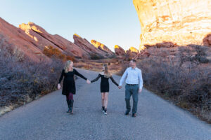 Littleton family photographer Red Rocks Amphitheatre Morrison Colorado photography fall winter mother father daughter