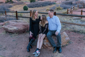 Littleton family photographer Red Rocks Amphitheatre Morrison Colorado photography fall winter mother father daughter