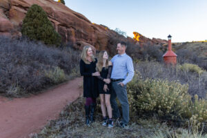 Littleton family photographer Red Rocks Amphitheatre Morrison Colorado photography fall winter mother father daughter