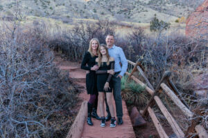 Littleton family photographer Red Rocks Amphitheatre Morrison Colorado photography fall winter mother father daughter