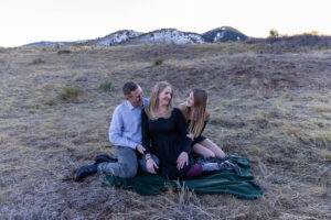 Littleton family photographer Red Rocks Amphitheatre Morrison Colorado photography fall winter mother father daughter