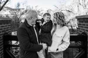 Littleton family photographer grandson grandchild grandparents extended photography Golden Colorado Clear Creek river boy mother father sons child brothers
