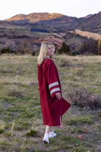 Littleton high school senior photographer cap and gown mini photo session Chatfield Mt. Falcon red rocks class of 2025 Colorado photography foothills college bound