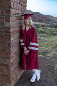 Littleton high school senior photographer cap and gown mini photo session Chatfield Mt. Falcon red rocks class of 2025 Colorado photography foothills college bound