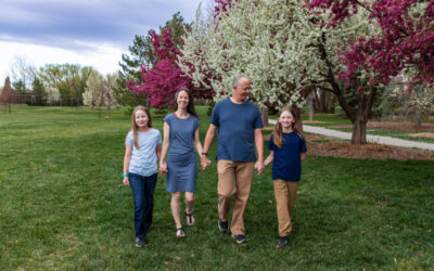 The {Z} family mini session in the pink and white blooming trees
