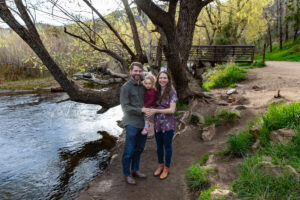 Littleton family photographer Lair O' the Bear park photography mountain foothills Colorado mother father daughter maternity baby bump