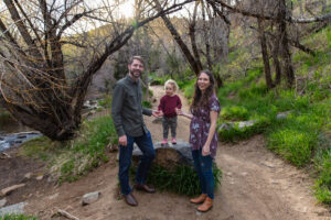 Littleton family photographer Lair O' the Bear park photography mountain foothills Colorado mother father daughter maternity baby bump