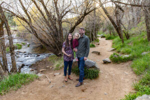 Littleton family photographer Lair O' the Bear park photography mountain foothills Colorado mother father daughter maternity baby bump