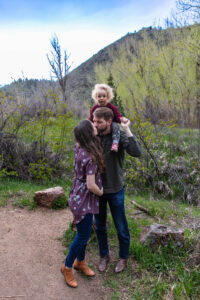 Littleton family photographer Lair O' the Bear park photography mountain foothills Colorado mother father daughter maternity baby bump