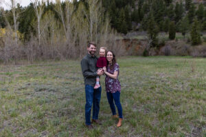 Littleton family photographer Lair O' the Bear park photography mountain foothills Colorado mother father daughter maternity baby bump