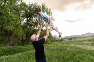 Littleton family photographer Colorado mother father son birthday photography foothills river Bear Creek state park little boy