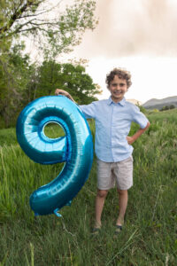 Littleton family photographer Colorado mother father son birthday photography foothills river Bear Creek state park little boy