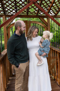 Littleton family photographer Morrison park mother father daughter little girl photography Colorado bridge river