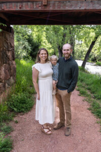 Littleton family photographer Morrison park mother father daughter little girl photography Colorado bridge river