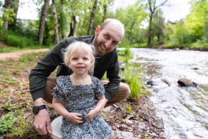 Littleton family photographer Morrison park mother father daughter little girl photography Colorado bridge river