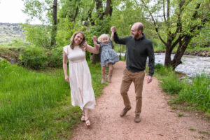 Littleton family photographer Morrison park mother father daughter little girl photography Colorado bridge river