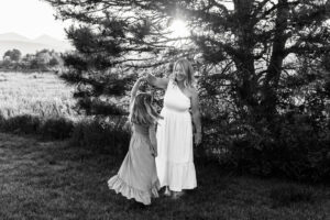 Littleton family photographer mini photo session photography Colorado mother daughter sunset golden hour fun sweet silly connection
