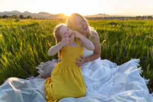 Littleton family photographer mini photo session photography Colorado mother daughter sunset golden hour fun sweet silly connection