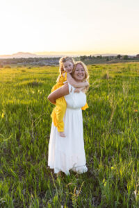Littleton family photographer mini photo session photography Colorado mother daughter sunset golden hour fun sweet silly connection