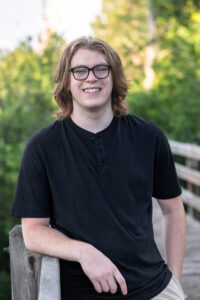 Littleton family photographer Writer's Vista park Colorado summer rainbow kids mother father son daughters bridge photography rain golden hour