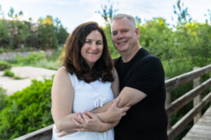 Littleton family photographer Writer's Vista park Colorado summer rainbow kids mother father son daughters bridge photography rain golden hour
