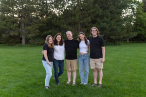 Littleton family photographer Writer's Vista park Colorado summer rainbow kids mother father son daughters bridge photography rain golden hour