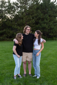 Littleton family photographer Writer's Vista park Colorado summer rainbow kids mother father son daughters bridge photography rain golden hour