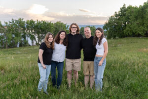 Littleton family photographer Writer's Vista park Colorado summer rainbow kids mother father son daughters bridge photography rain golden hour