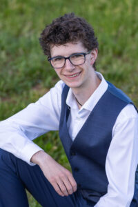 Littleton high school senior photographer Front Range Christian teen boy photography Colorado South Valley red rocks suit tech technology theater kid Class of 2026