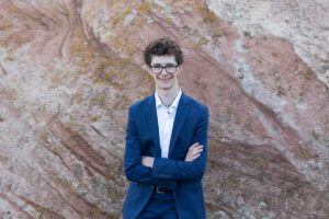 Littleton high school senior photographer Front Range Christian teen boy photography Colorado South Valley red rocks suit tech technology theater kid Class of 2026