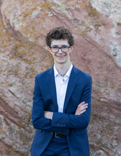 Littleton high school senior photographer Front Range Christian teen boy photography Colorado South Valley red rocks suit tech technology theater kid Class of 2026