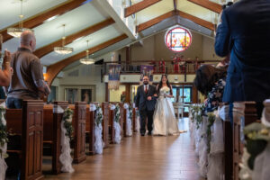 Littleton wedding photographer bride and groom Catholic ceremony Colorado photography flowers Mass married marriage church ceremony Spanish family