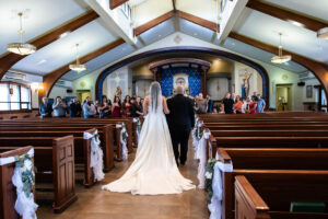 Littleton wedding photographer bride and groom Catholic ceremony Colorado photography flowers Mass married marriage church ceremony Spanish family